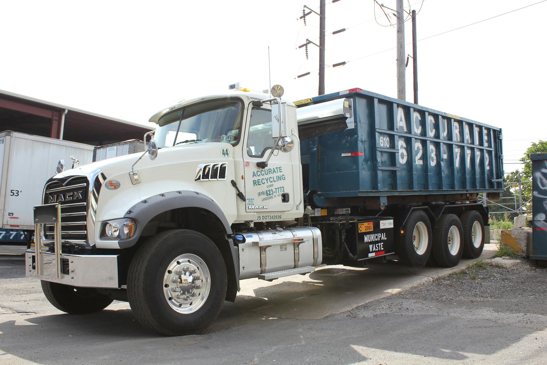 Dumpster drop off truck