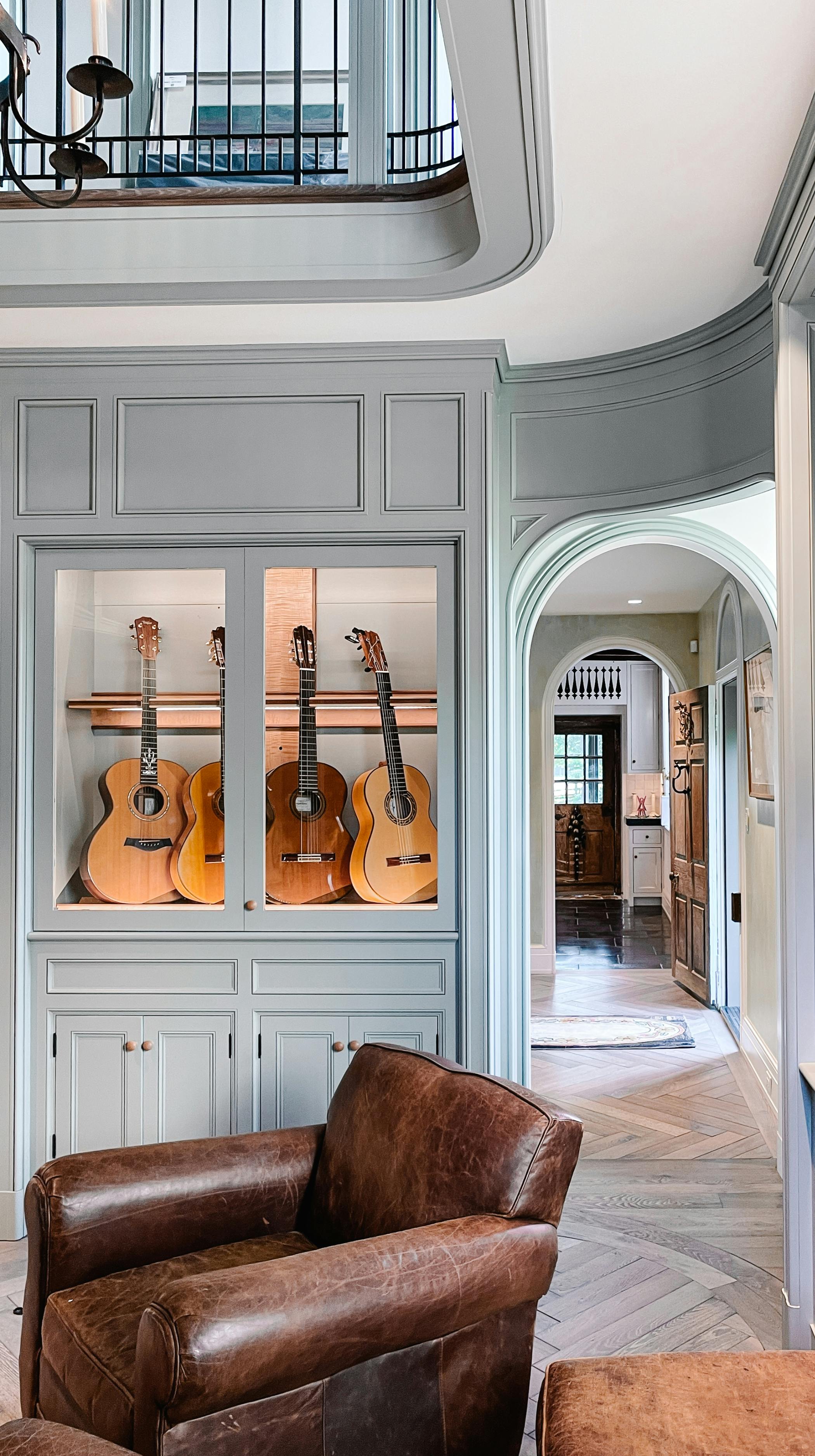 music room interior design ideas for how to display guitars by american music furniture