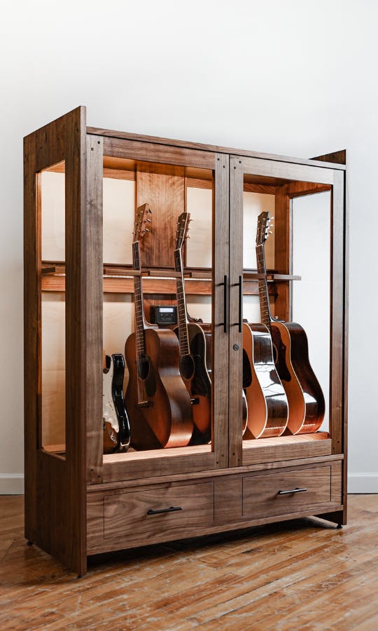 hyla walnut guitar wall hanger mounted by american music furniture