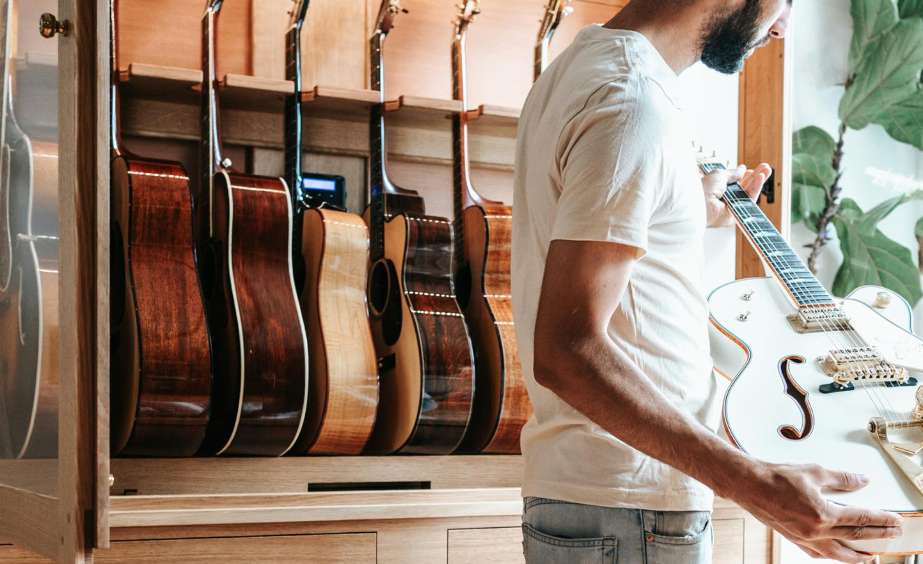 humidified guitar storage cabinet with humidifier