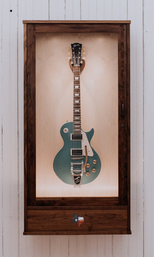 music room guitar wall hanger display showcase by american music furniture