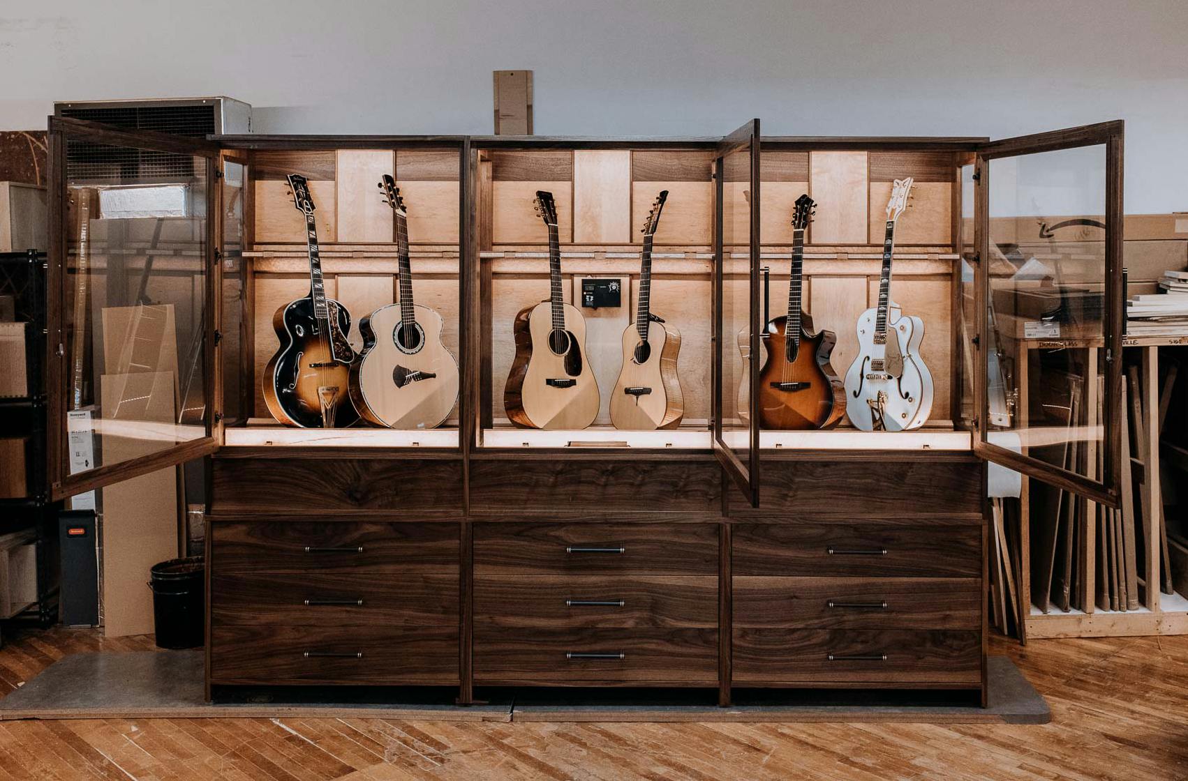 large walnut custom guitar humidor cabinet and display for music room