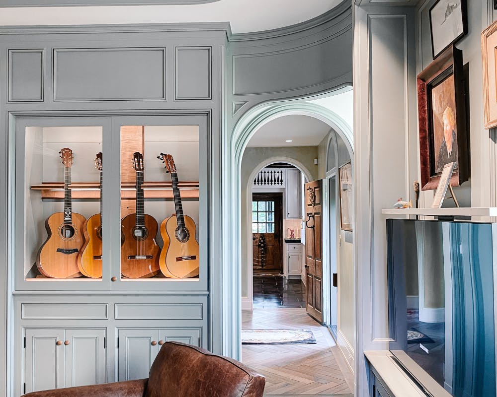 custom guitar display built-in music room interior design by american music furniture