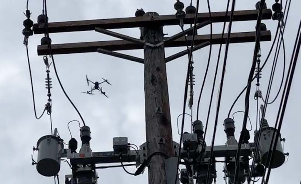 drone technology conducting aerial utility pole inspections