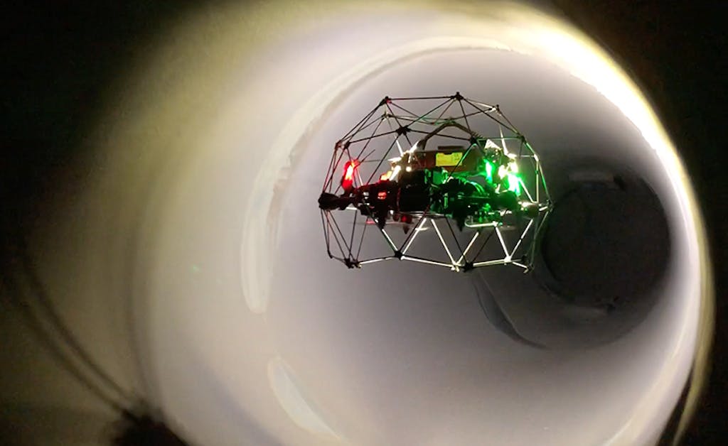 Drone collects data in confined space that is illuminated by the drone light.
