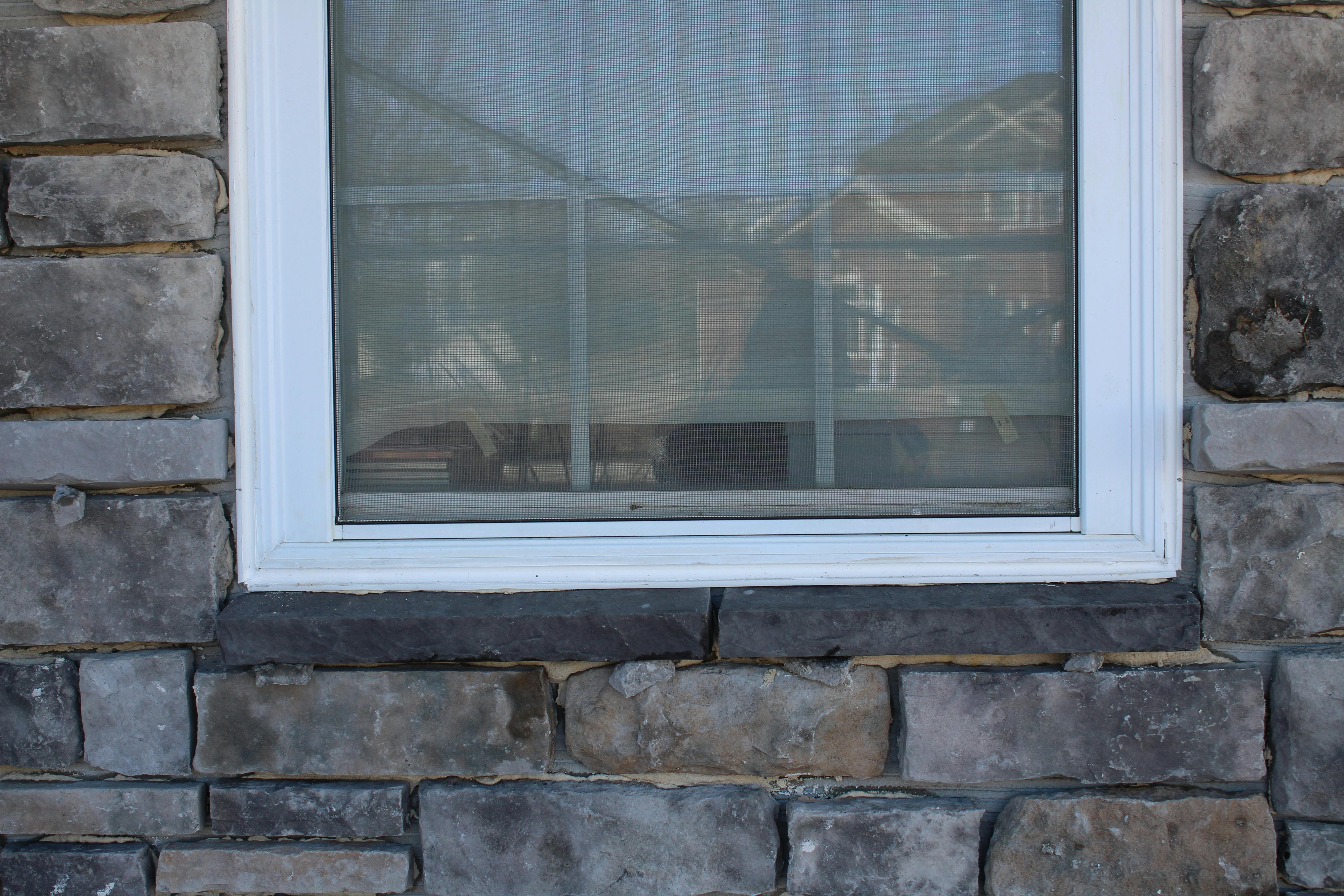 stone veneer around a window