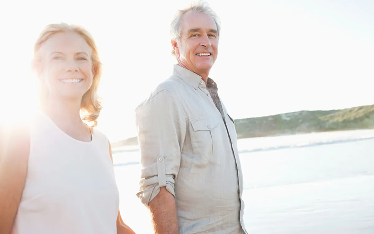 Couple walking on the beach