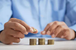 Person counting money