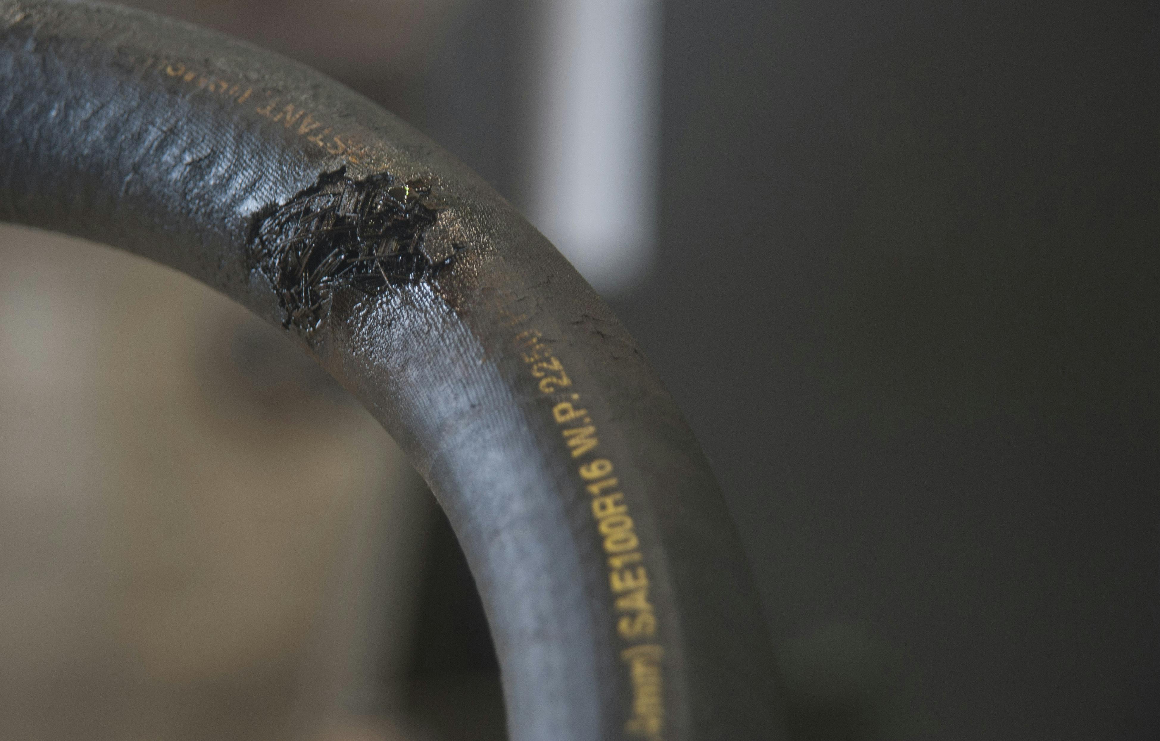 abrasion damage to hydraulic hose