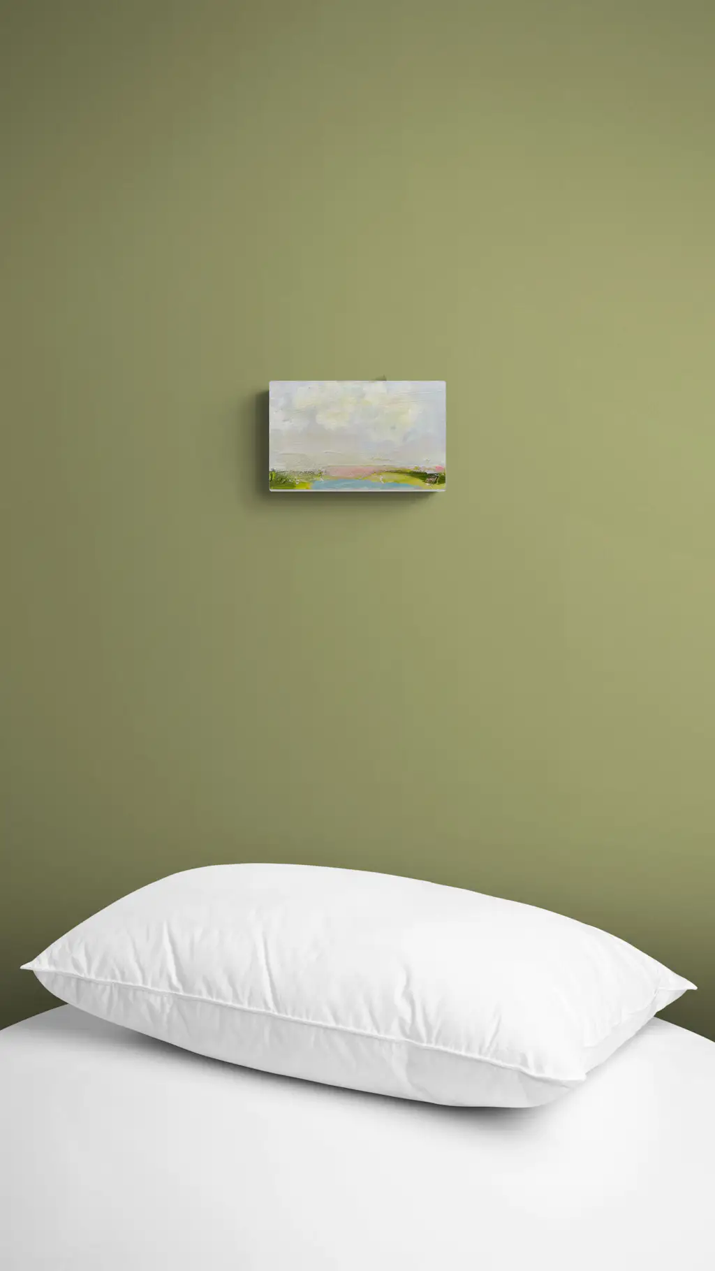 Painting by mandy morroni hung on a wall in a room.
