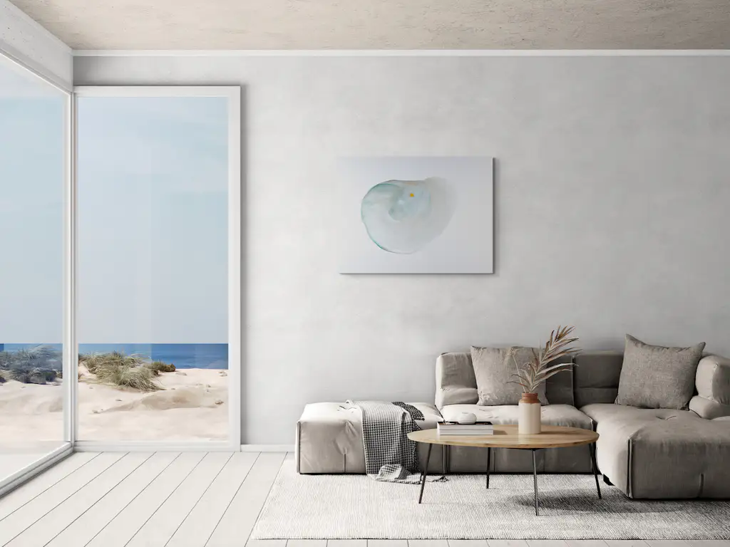 Painting 'breath' hung on a wall of a coastal living room.
