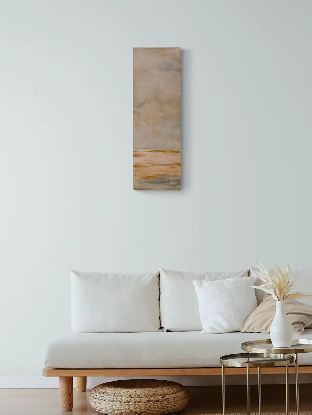 Painting by mandy morroni hung on a wall in a room.