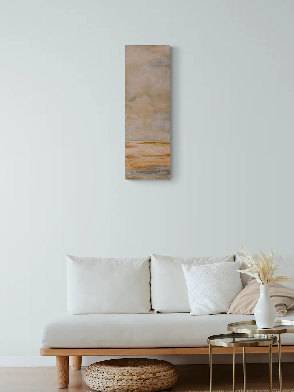 Painting by mandy morroni hung on a wall in a room.