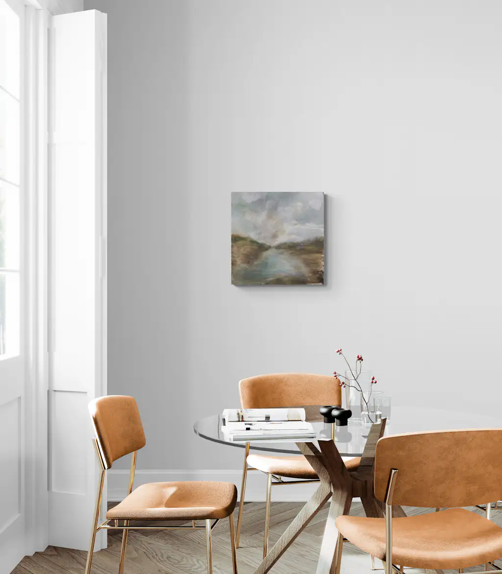 Painting by mandy morroni hung on a wall in a room.