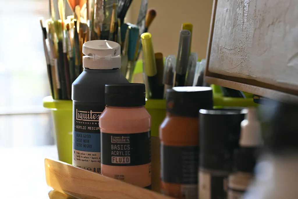 close up of paint containers