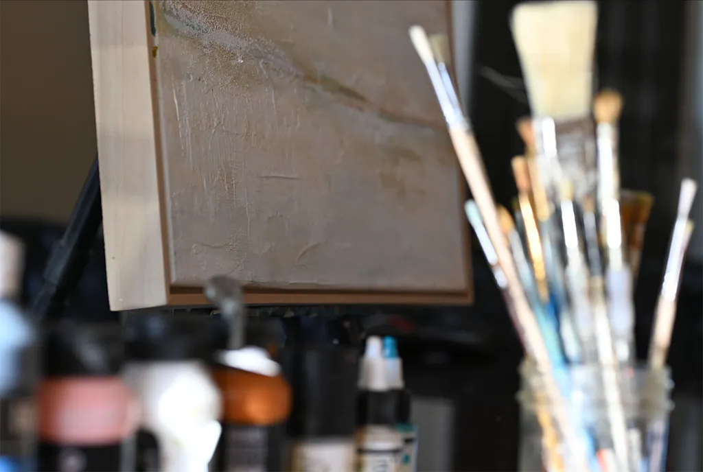 close up of paint and brushes