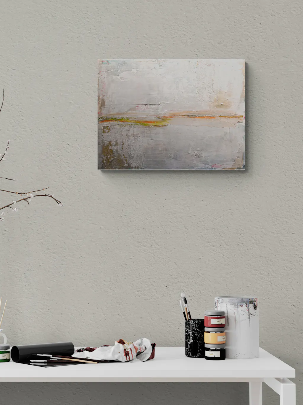Painting by mandy morroni hung on a wall in a room.
