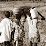 Africa – Carrying Water from Behind