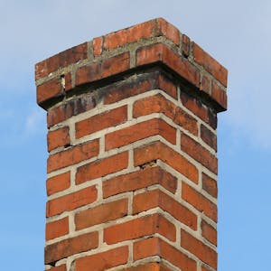 Worn brick chimney