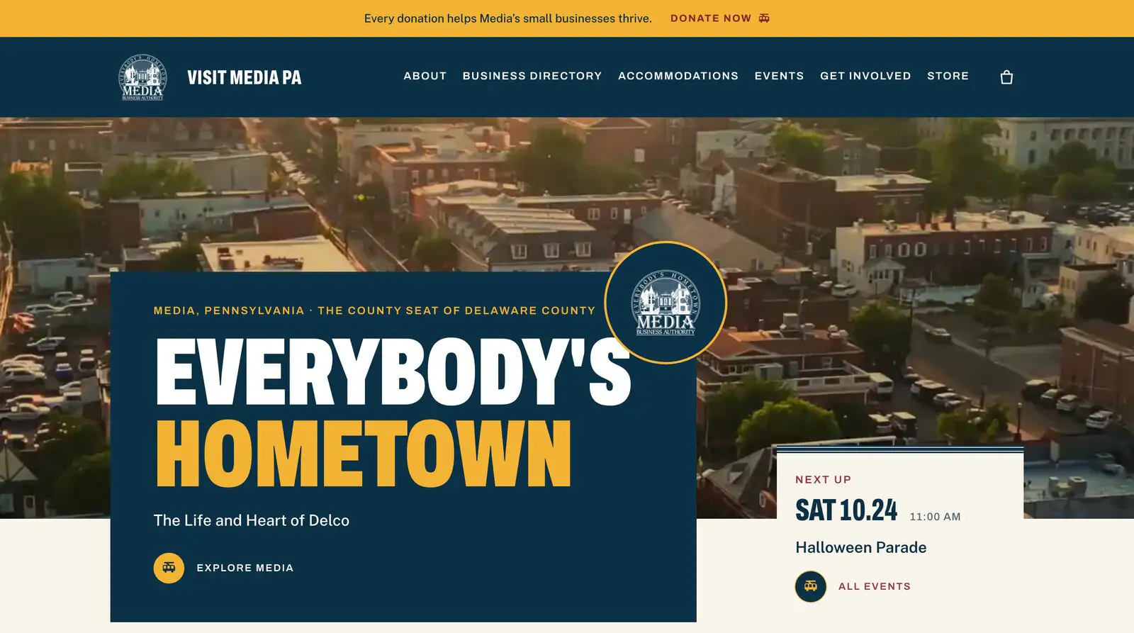The VisitMediaPA home page after the rebuild — large sans headline over an aerial photograph of Media, with the next event surfaced alongside