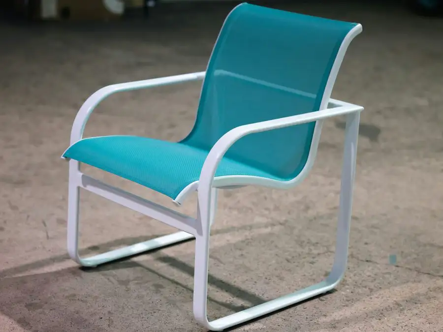 Restored chair with a white frame and a teal sling