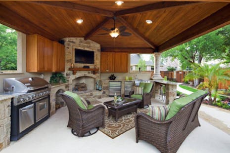 outdoor living space with outdoor kitchen