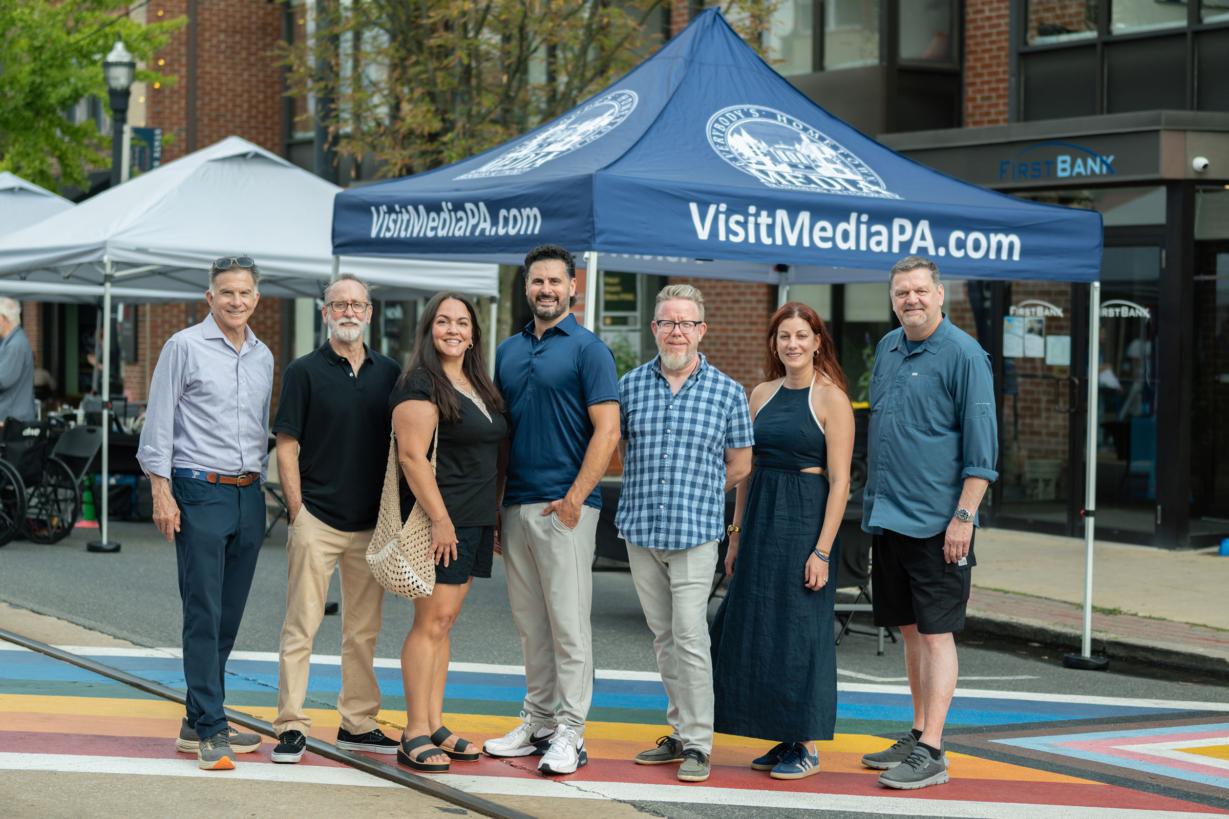 The Media Business Authority team under a VisitMediaPA.com tent on State Street