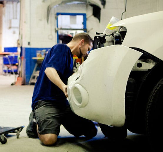 car repairs at a collision repair shop